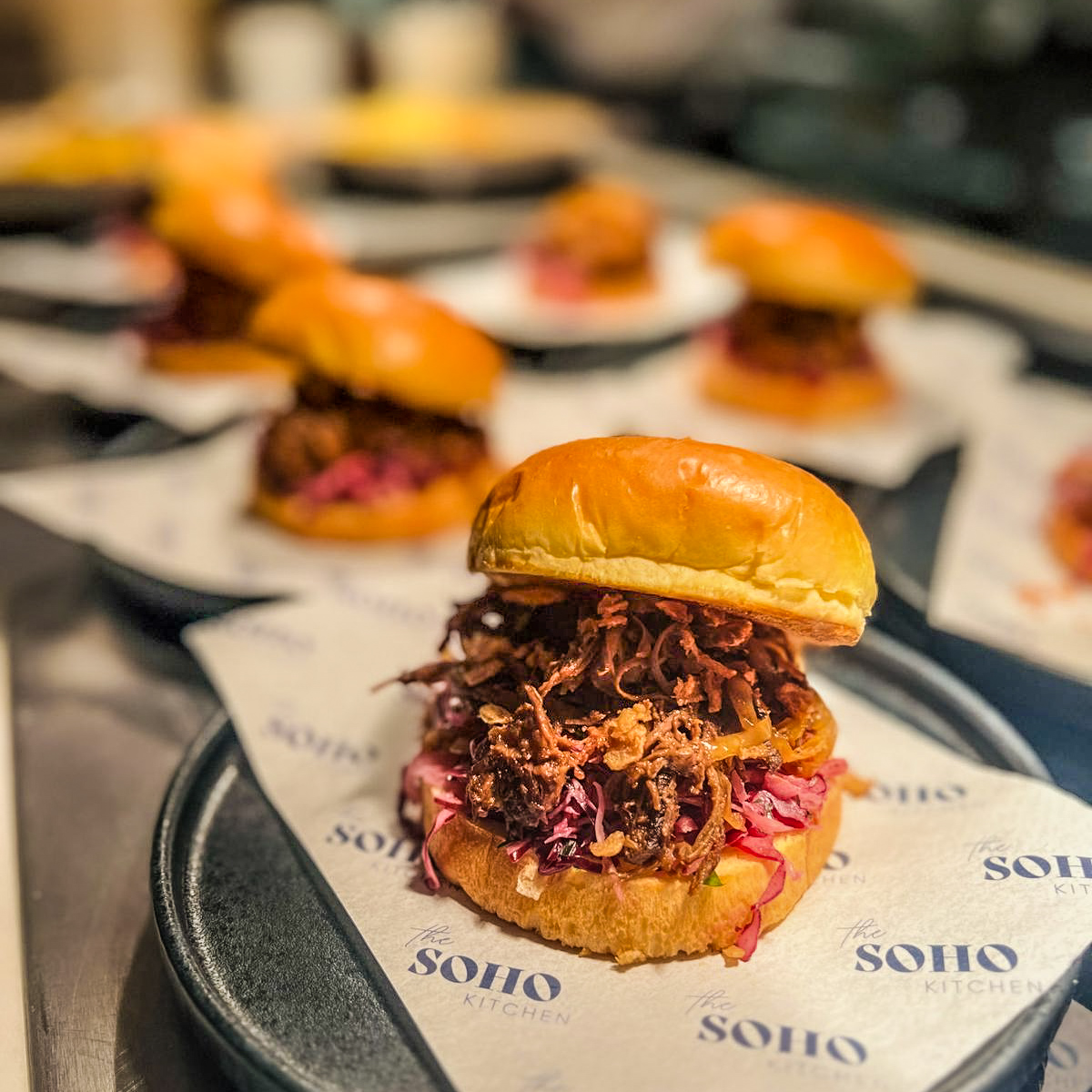 Feast your eyes on this mouthwatering pulled pork roll at one of our locations today! 🤤🍔 #eatwell #havefun #promisesdelivered