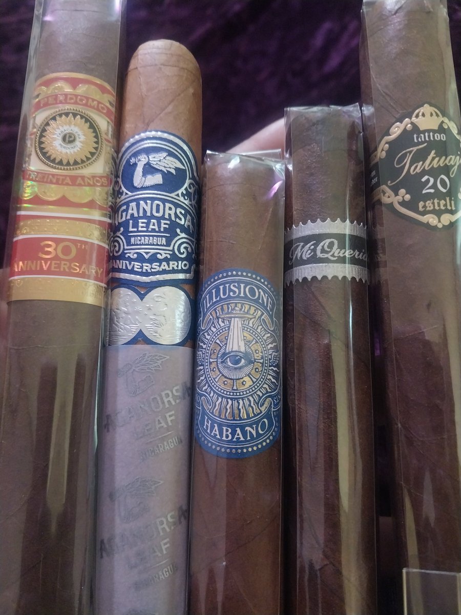 Negranomicon0's tweet photo. Thanks, Sam with @Smokeinn! I just got my @CigarDojo Top Cigars of 2023 sampler today...plus bought a cutter and they threw in this kick ass hat! 
#cigars 
#smokeinn
#cigardojo https://t.co/5orjAjtqso