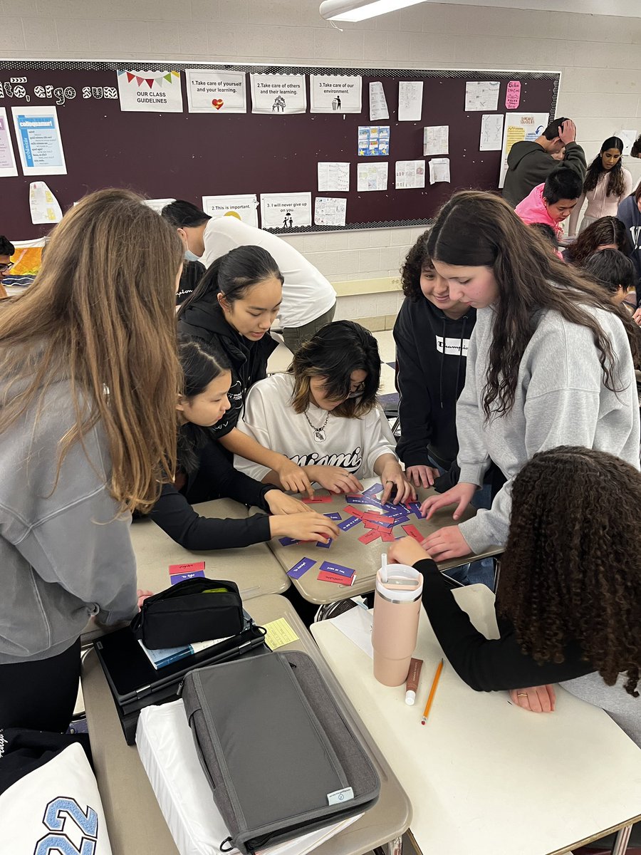 magistrabarbosa's tweet image. Latin II from the high school visits 8th grade Latin for some World Language week fun…Students worked together on a verb activity and Roman numeral math 📚 #worldlanguageweek @WestonWorldLang