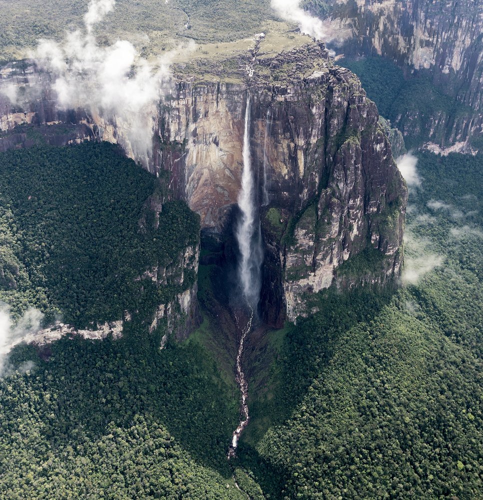 Angel Falls, Venezuela technically, the largest known falls is the Denmark Strait cataract, which lies beneath the Atlantic Ocean. But, on land, Angel Falls takes the literal top spot as the world’s tallest waterfall, crashing 3,212 feet (979m) over the edge of the Auyán-tepui…