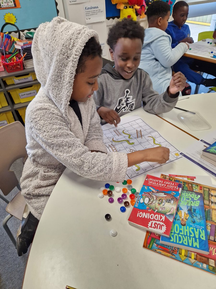LozellsHR's tweet photo. Great World Book Day fun in #Class5T today. We read the amazing book called 'How to Live Forever' by Colin Thompson. We then designed our own snakes and ladders game adding questions about the book for others to try. @LozellsPrimary #readingfun #WorldBookDay2024 https://t.co/3nuBwTH0d0
