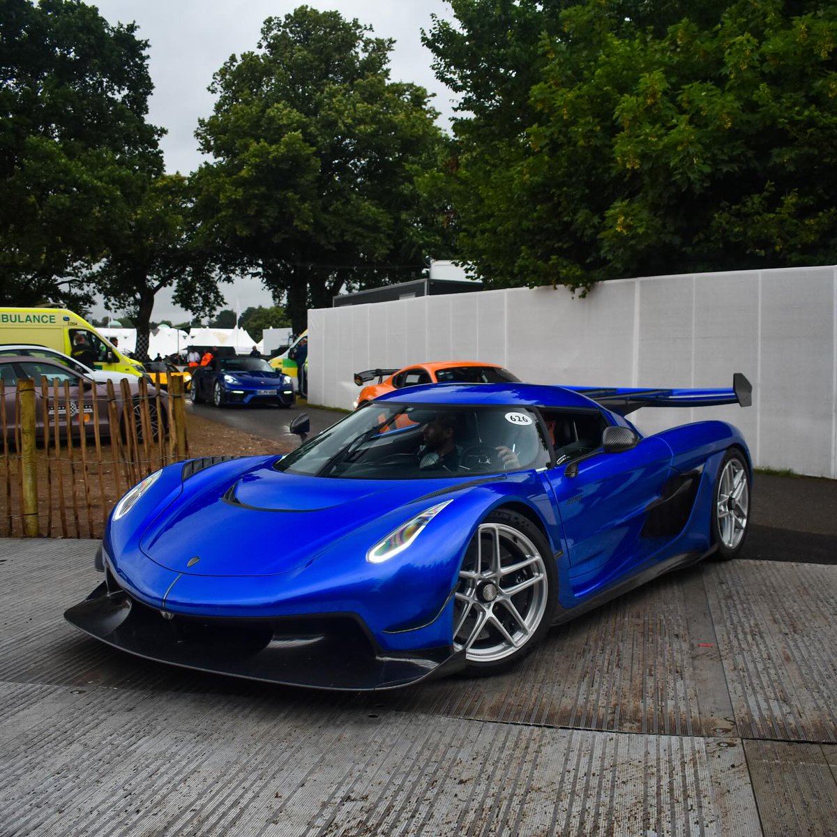 CarManToday's tweet photo. FOS always brings out a solid array of Hypercars, this Jesko was no exception last year blasting up the hill 
#koenigsegg #jesko #koenigseggjesko #supercars #ghostsquadron #fos #festivalofspeed #goodwood https://t.co/cRa8dQxWkU