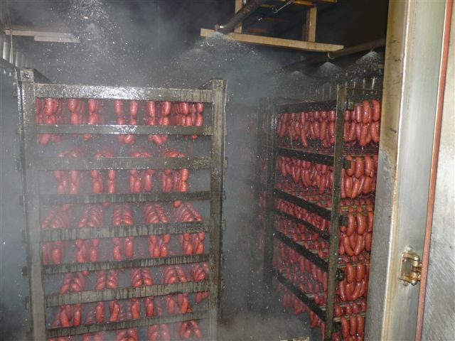 cuetopia's tweet image. Unloading 4,000 lbs of sausage out of smokehouse