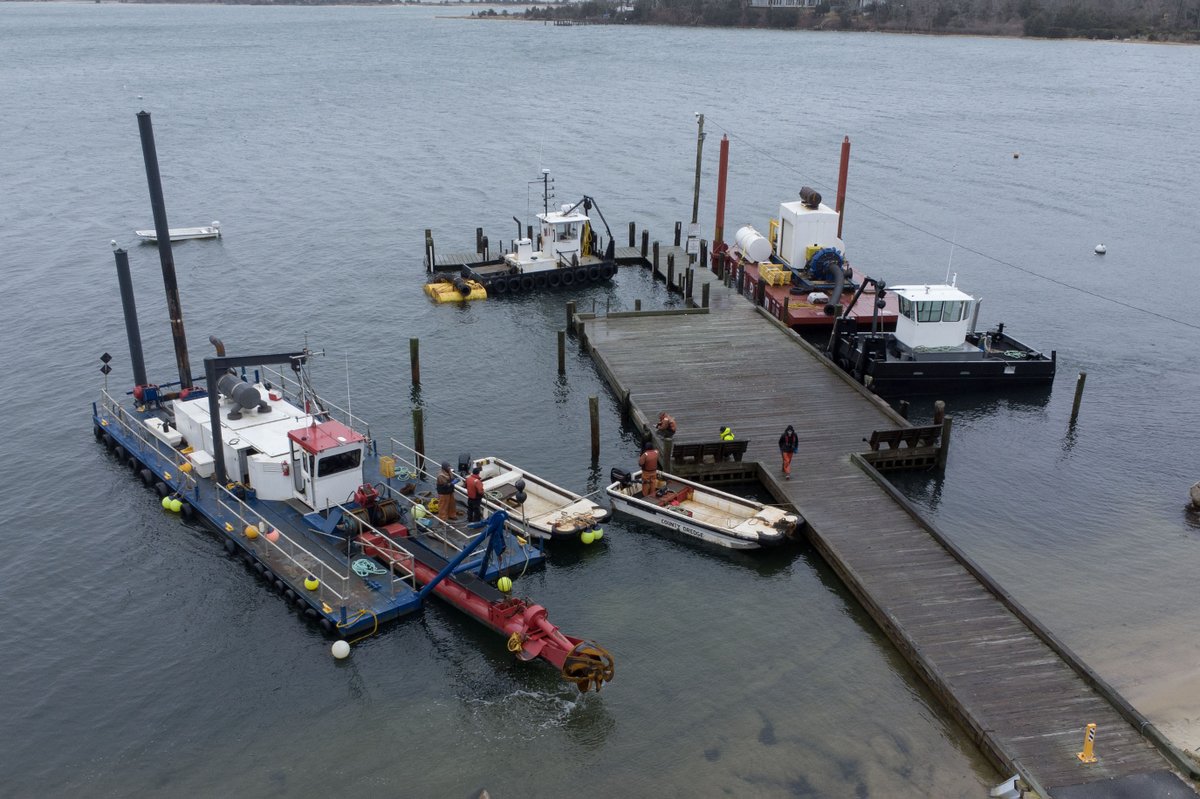 cctphoto's tweet photo. Crews ready the Barnstable County Dredge, at left, along the Town Dock in Cotuit as they prepare to start a project at the Cotuit Bay entrance. The materials from the project will be used for beach nourishment at the eastern end of Dead Neck.  @capecodtimes https://t.co/sNknt0c5hd