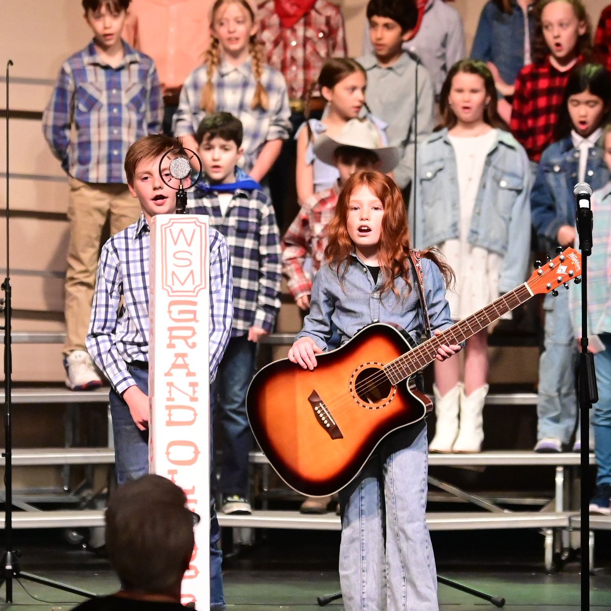 Ensworth's tweet photo. Paying tribute to the iconic Grand Ole Opry with the Big "E" Opry concert! 🎶 Grade 4 students presented "From Humble Roots to Sequined Suits." What a fantastic evening of rhinestones and cowboy hats!
.
#ensworth #joyinlearning #excellenceinacademics #countrymusic https://t.co/e91TPvE8La