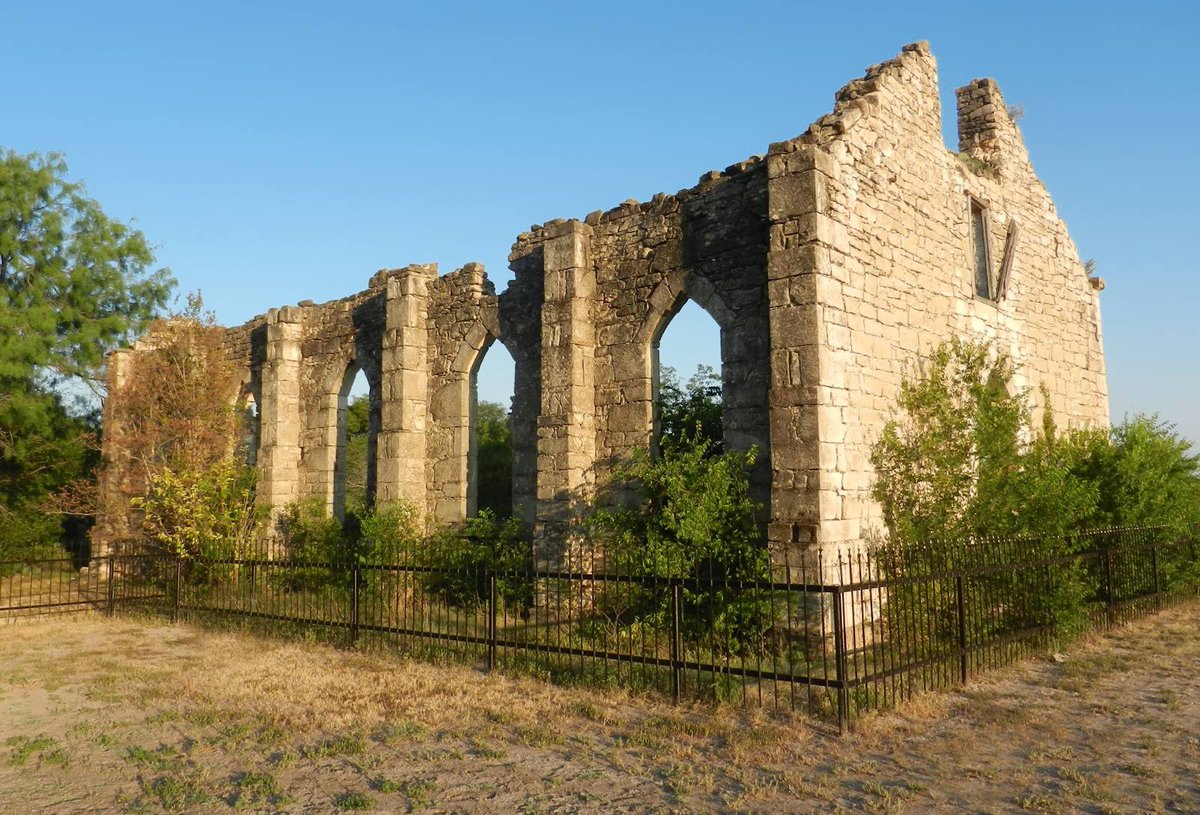 TracesofTexas's tweet photo. The Arcane Texas Fact of the Day is in regard to the church shown in this photograph, taken by Traces of Texas reader Bill Traylor in D'Hanis, Texas a few years ago. This is the ruins of the St. Dominic's Catholic Church in D'Hanis, which is a small Medina County town about 40 miles west of San Antonio.  The congregation of St. Dominic's was formed in 1847 with the founding of the  D'Hanis Colony by settlers from Alsace, France. In 1853, when the town became a mission parish, this limestone church was built, using timber hauled by ox-wagon from the Medina River.  Upon the arrival of the first resident pastor,  a sandstone extension was added in 1868.  But the church was abandoned in  1914 when a new church was built in "New" D'Hanis (1 1/2 miles west). The cemetery, dating from the burial of children of colonists in 1847, was used until 1893, when a new cemetery was started following a diphtheria epidemic. 

Thank you, Bill.  Gorgeous!