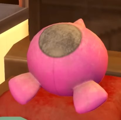 Pecharunt would be laying down next to a plate of purple mochi waiting for someone to eat some