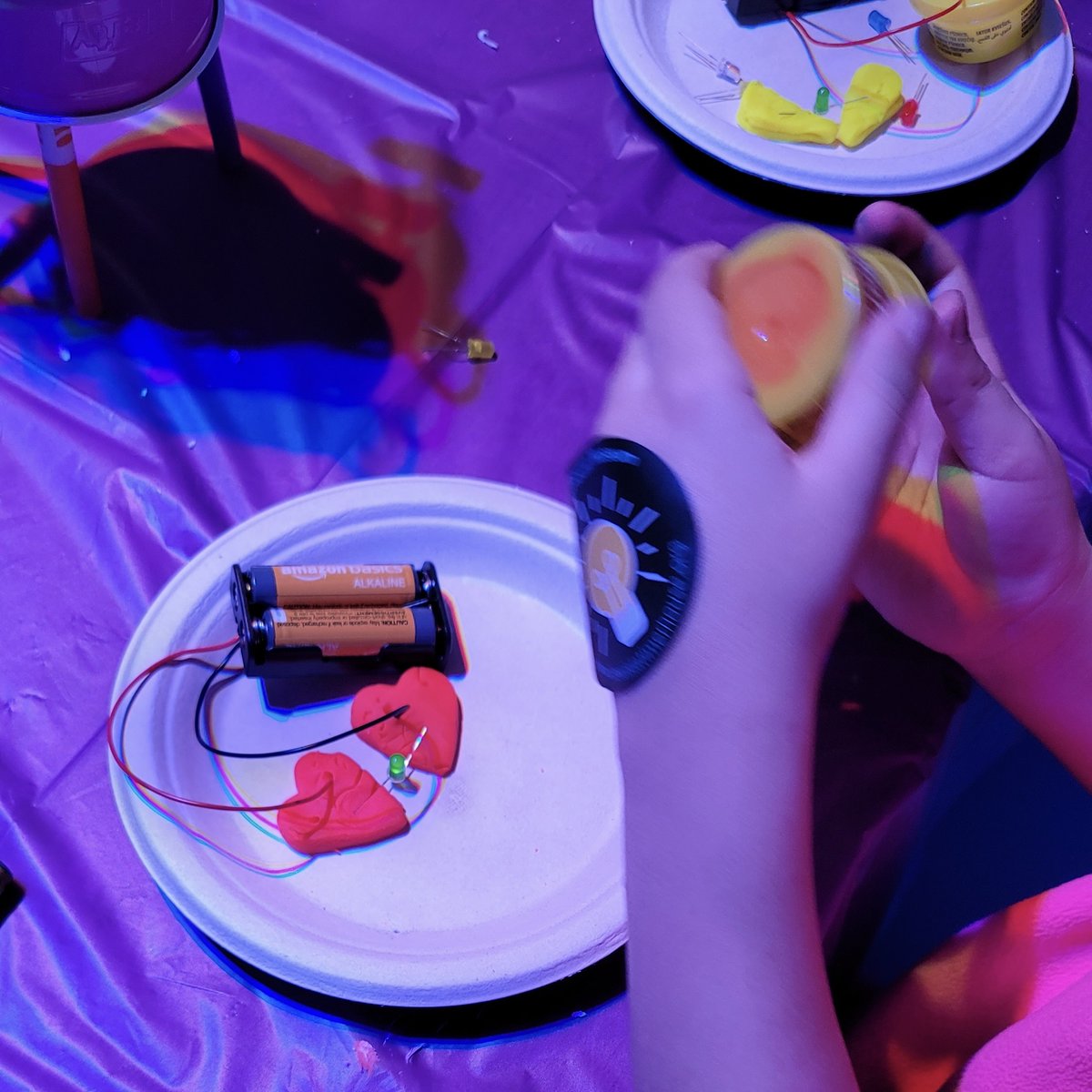 Last month, we joined a STEAM family event at @nysci. Participants learned about Lewis Latimer and the important role he played in the history of electric lighting while working together to light up LEDs with the help of Conductive Play-Dough!