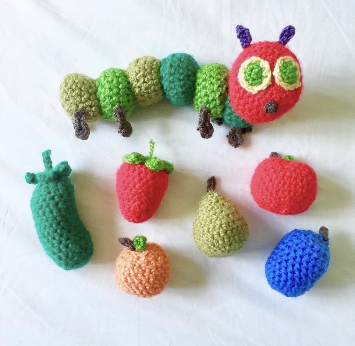 woolyoddities's tweet photo. Happy World Book Day! Throwing it back to a 2017 creation of The Very Hungry Caterpillar. Still one of my favourite books 🐛 🥦🍎🍊🍓🍇🍌🍒 #worldbookday #theveryhungrycaterpillar #ericcarle #crochet #handmadehour https://t.co/BKH3CSWKCW