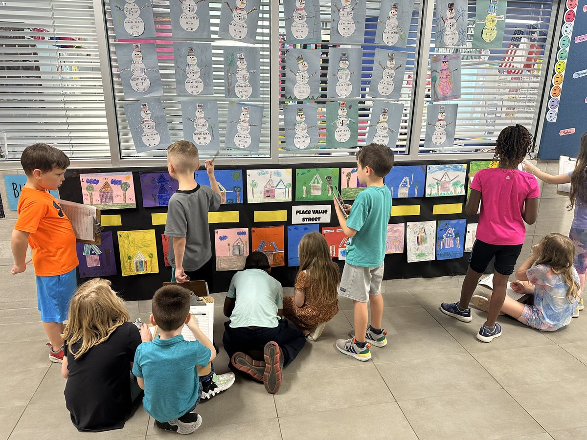 Mcbee1st's tweet photo. Place Value Street in the first grade hallway! Fun &amp; engaging way to get students building numbers &amp; showing the numbers in different ways (expanded form, standard form, etc.).
@WISDLagway https://t.co/IzbmyacPtT