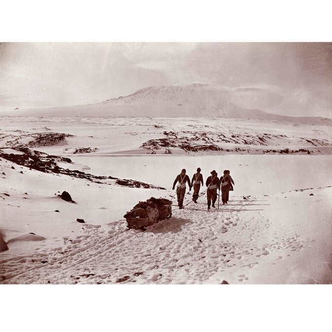 📸 Members of Shackleton's 'Nimrod' Expedition with Mt Erebus in the background, Copyright unknown.


