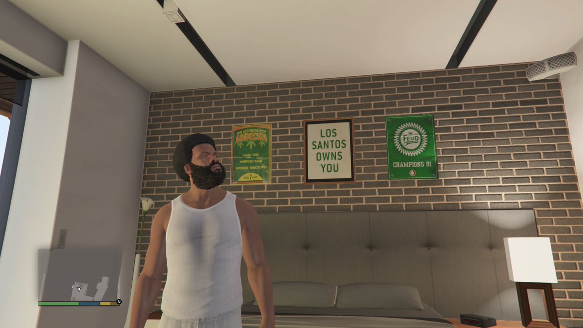 I just #Noticed this #Racist shit in #GTA5 #StoryMode above #Franklins bed the sign saying “Los Santos Own you “ is just keeping that #SlaveMentality he supposed to be a made man and to have that above his bed what kind of shit is that #Rockstar