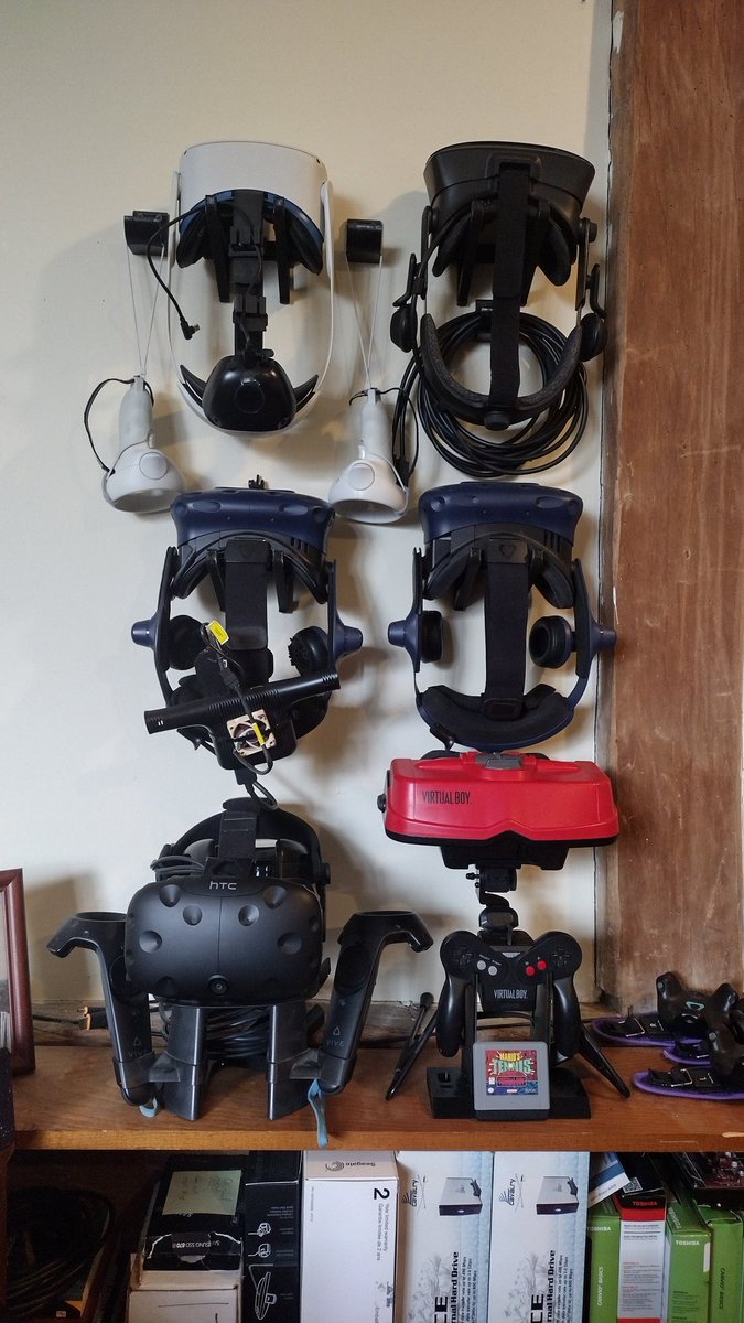 AWhaleWithAFace's tweet image. Finally organized the family. Not pictured is my current main, the Varjo Aero, but I still use the #Quest2 for exercise, world testing, and travel. @htcvive #ValveIndex #VirtualBoy