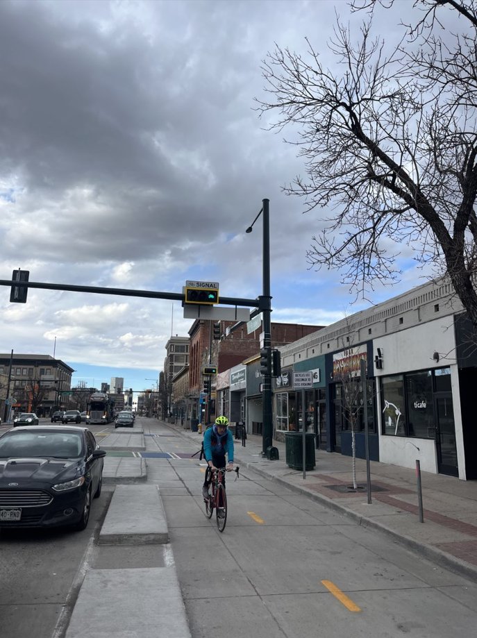 davidpulsipher's tweet photo. had a great time/ride last night with friends at @DenverDOTI @CityofDenver celebrating the Broadway protected bike lane. This is a world class facility, and Denver should be proud. Not just a great design, with bike signals, maybe more importantly - it's in the heart of our city! https://t.co/P0md3knmxI