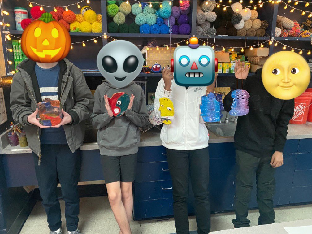 A couple of proud kiddos with their clay projects!