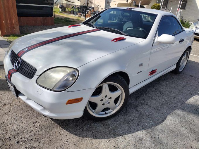 Some more flare today. I painted and added vents, changed the chrome emblems to black and added a personalized