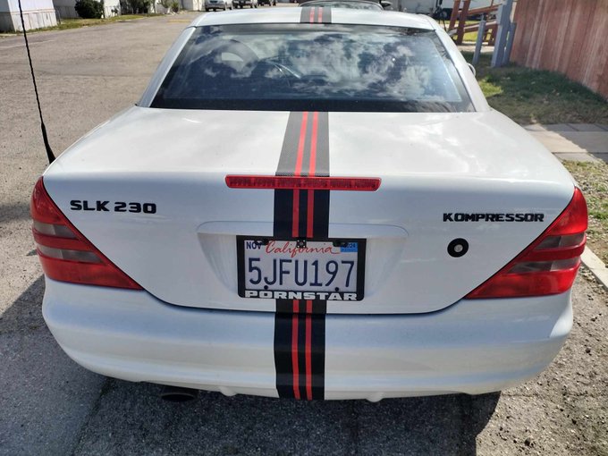 Some more flare today. I painted and added vents, changed the chrome emblems to black and added a personalized