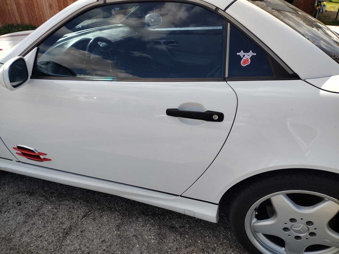 Some more flare today. I painted and added vents, changed the chrome emblems to black and added a personalized