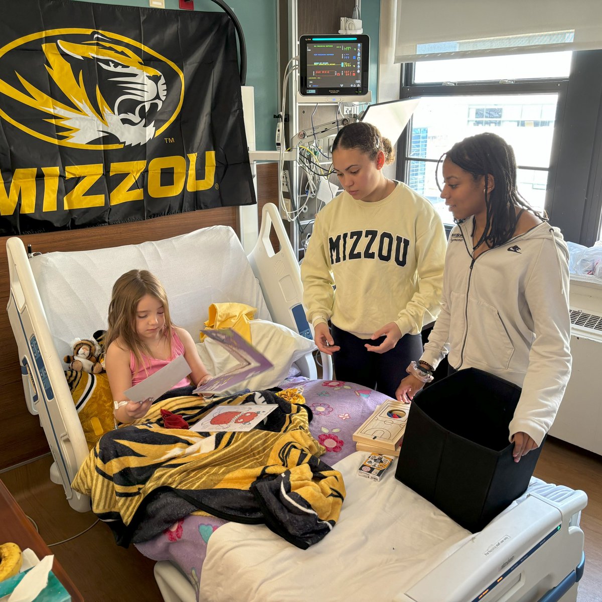 Yesterday was a bittersweet moment as we had our last P4H visit of the season. This visit went to Oakleigh who was surprised by <a href="/mizzougym/">Mizzou Gymnastics</a> gymnasts Amaya Marshall and Kyra Burns. Oakleigh took the gymnasts to the pediatric playroom to showcase her many talents! 🤸‍♀️🏀🎨