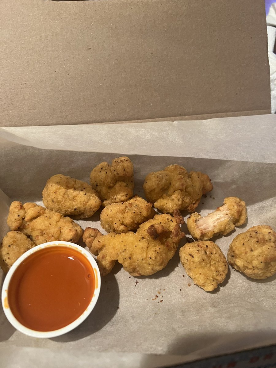 Yo! <a href="/dominos/">Domino's Pizza</a> did y’alls delivery man take a bite out of one of my nugs?? #OneBite