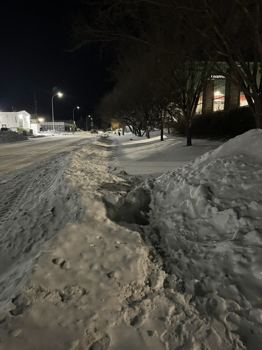 Johnathonmac31's tweet photo. @RMWoodBuffalo any idea when the Queen street sidewalk is going to get plowed been 4 days now called pulse last night and still not done and someone with disabilities shouldn’t have to walk on the side of the road at night time. https://t.co/4VhZg6X8nC