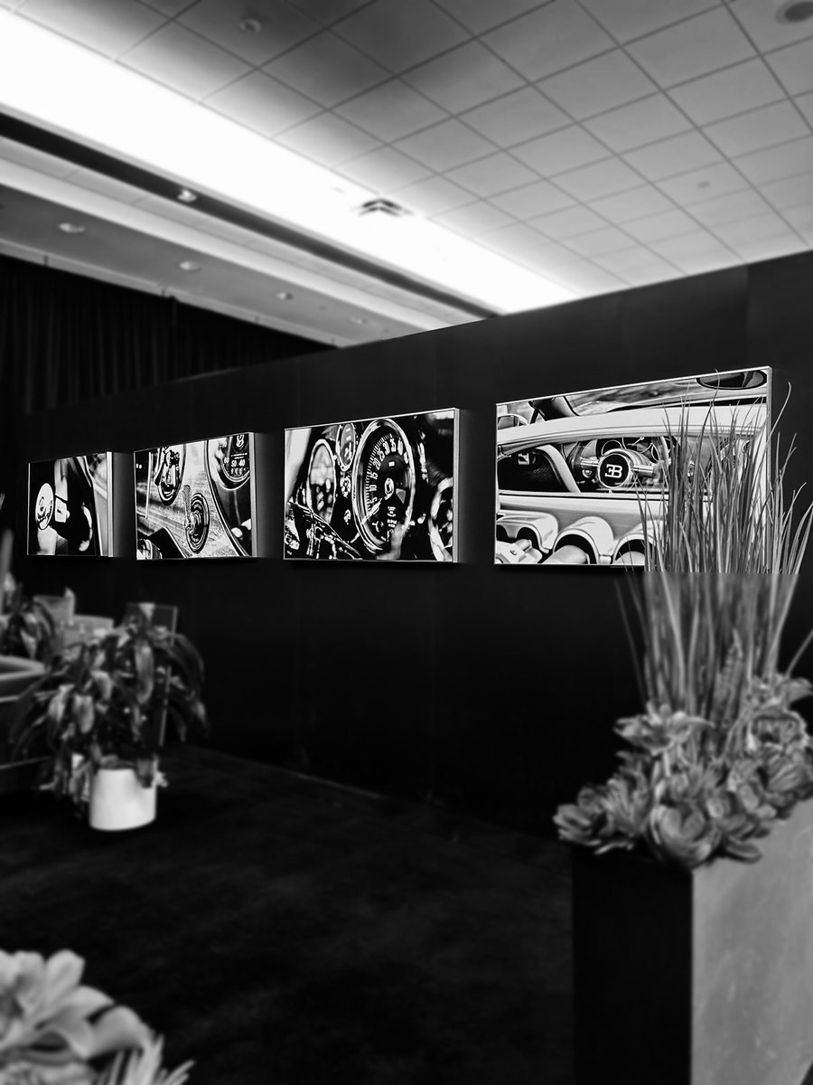 It’s always special when someone chooses to hang my photography up on their wall, but seeing 4 of my framed canvas prints hanging in the @grandtouringautos display at the Auto Show was incredibly impactful.