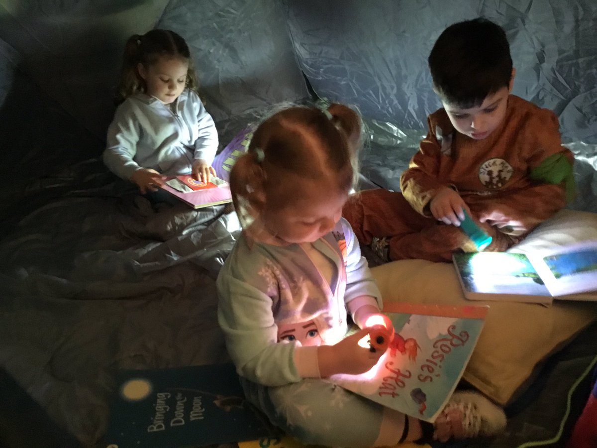 ListerinfN's tweet photo. Nursery enjoyed celebrating World Book Day. The theme this year was bedtime stories. The children were comfy and cosy reading their books by the campfire and in their dens. https://t.co/YvUP0EjohA