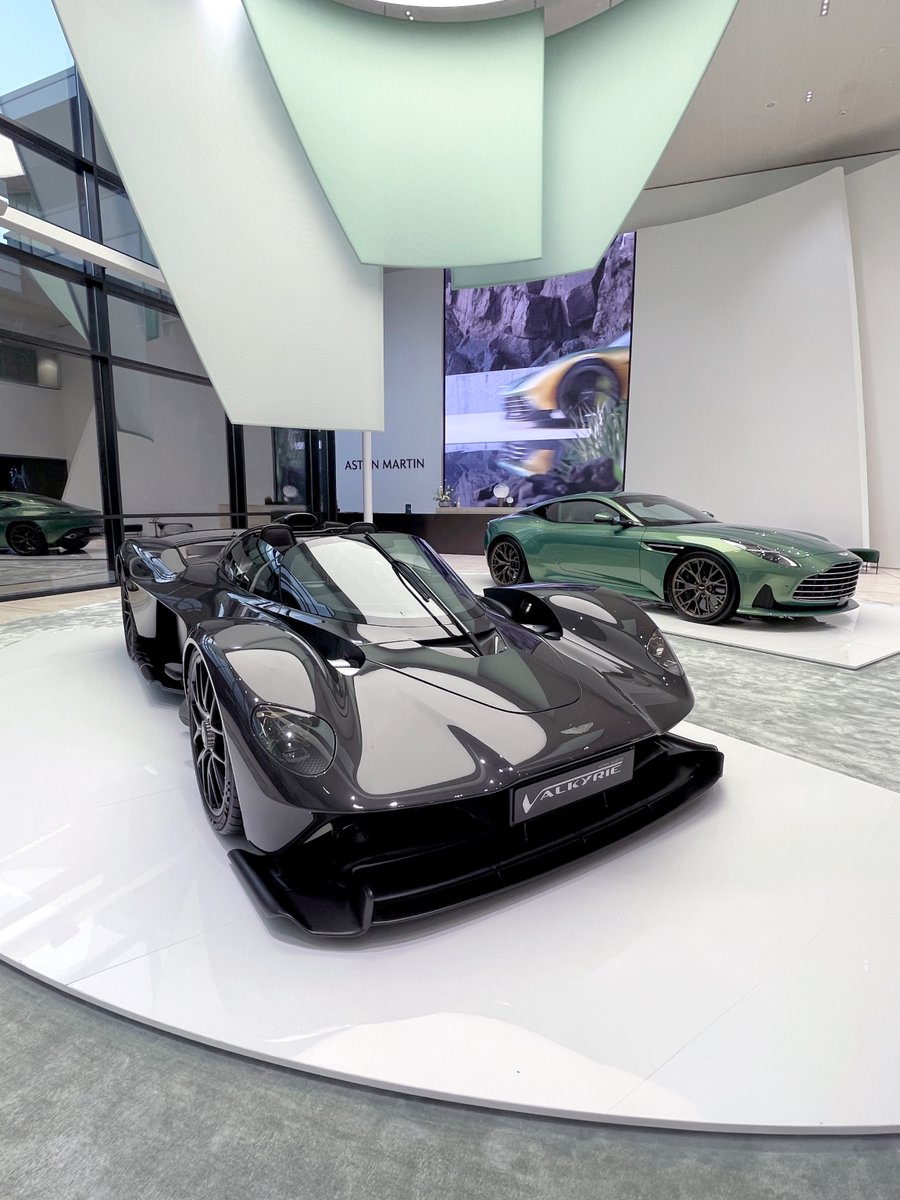 AstonHatfield's tweet photo. The Aston Martin Valkyrie and the DB12 at the state-of-the-art headquarters in Gaydon, built upon the passion, skill and creativity of the people who dedicate their working lives to the most iconic brand in the world.

#AstonMartin #Valkyrie #DB12 #ICONDRIVEN #AstonMartinHatfield https://t.co/LPGYTmIk4g