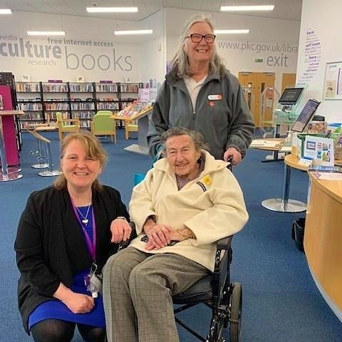 CPKLibraries's tweet photo. On #InternationalWomensDay, meet Alma, a Strathtay House Care Home resident in Perth. Alma, who will turn 105 years old next week, attended our knit & crochet group at #NorthInchLibrary and was joined by children from @st_johnsacademy who sang some songs to her. πͺ https://t.co/4Xu41cfSX8