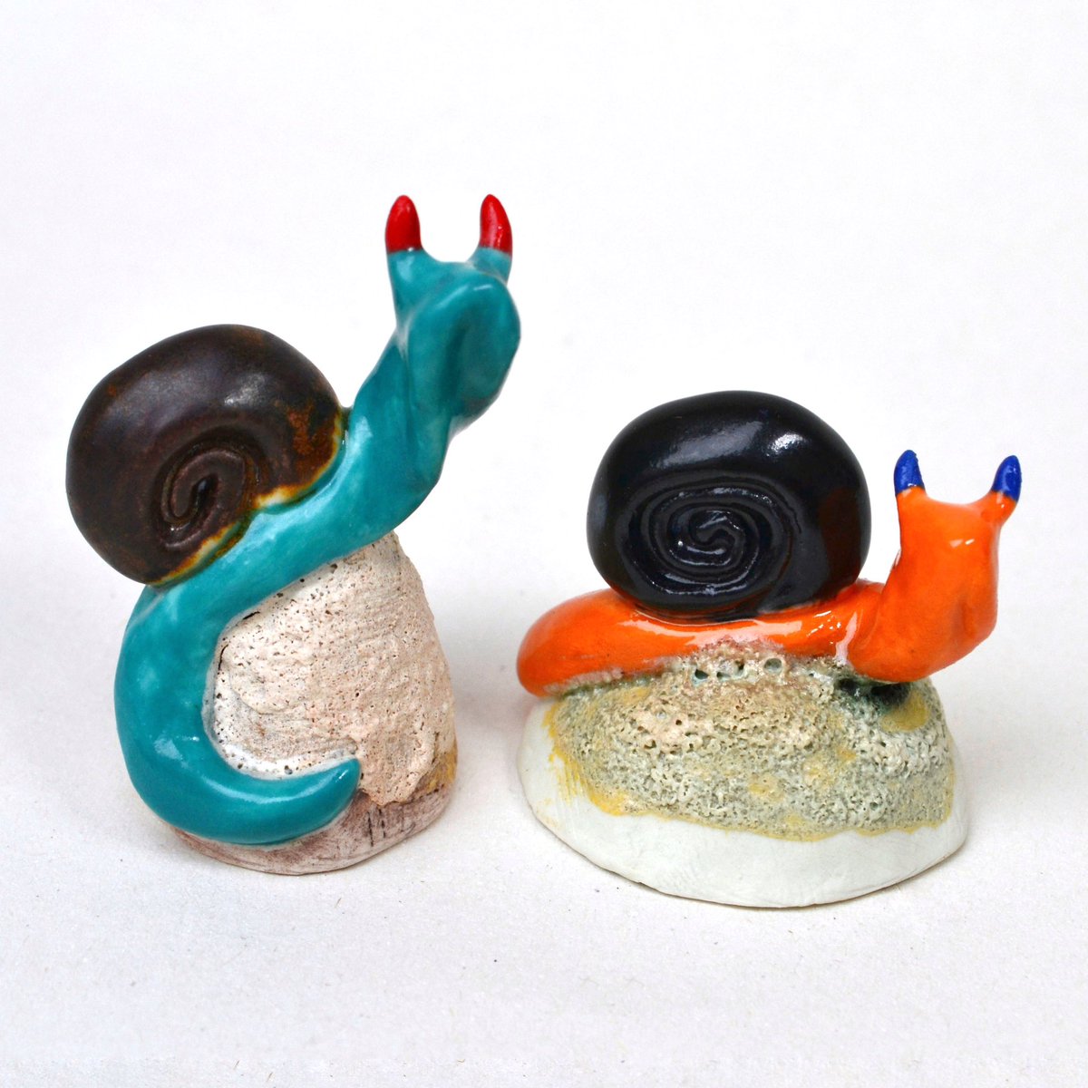 Suzanne_Shadow's tweet photo. I’ve really enjoyed testing &amp; playing with oxides, underglazes &amp; glazes on these little’uns. Decided to go for bright and characterful snails rather than too life like. What do you think? They are now up in my website shop if anyone wants to have a further look 🐌 #ceramics https://t.co/6Ae0yaFbxN