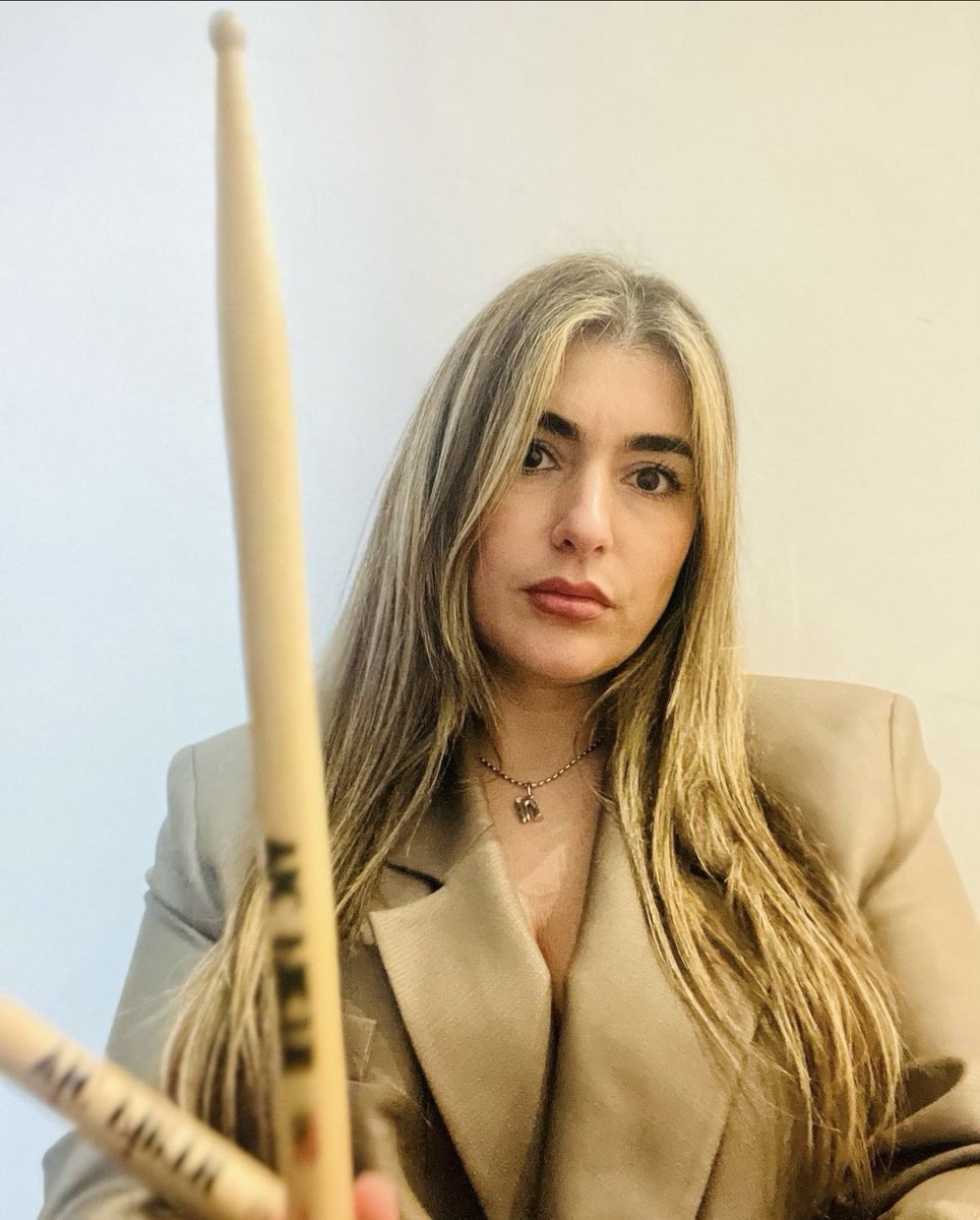 Naima Acuna is giving “my drumsticks are an extension of myself” energy here.