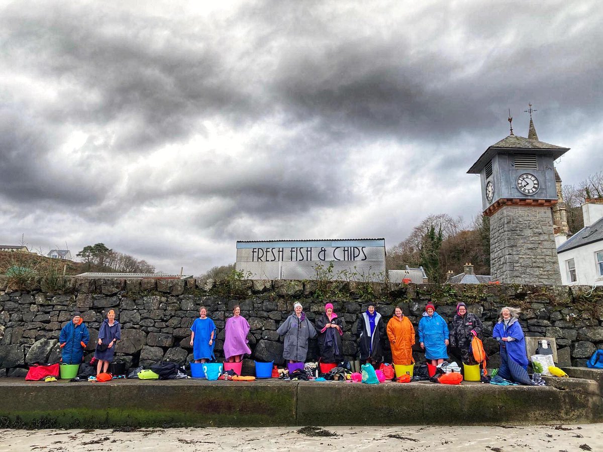 Today's #InternationalWomensDay . The local swimmers took to the water in #Tobermory . An amazing friendship group who support each other & encourages anyone to enjoy the benefits of open water swimming 💦❤️ (I'm sure I see @coopuk blue bags in that line up) 📷 Alice Stillman