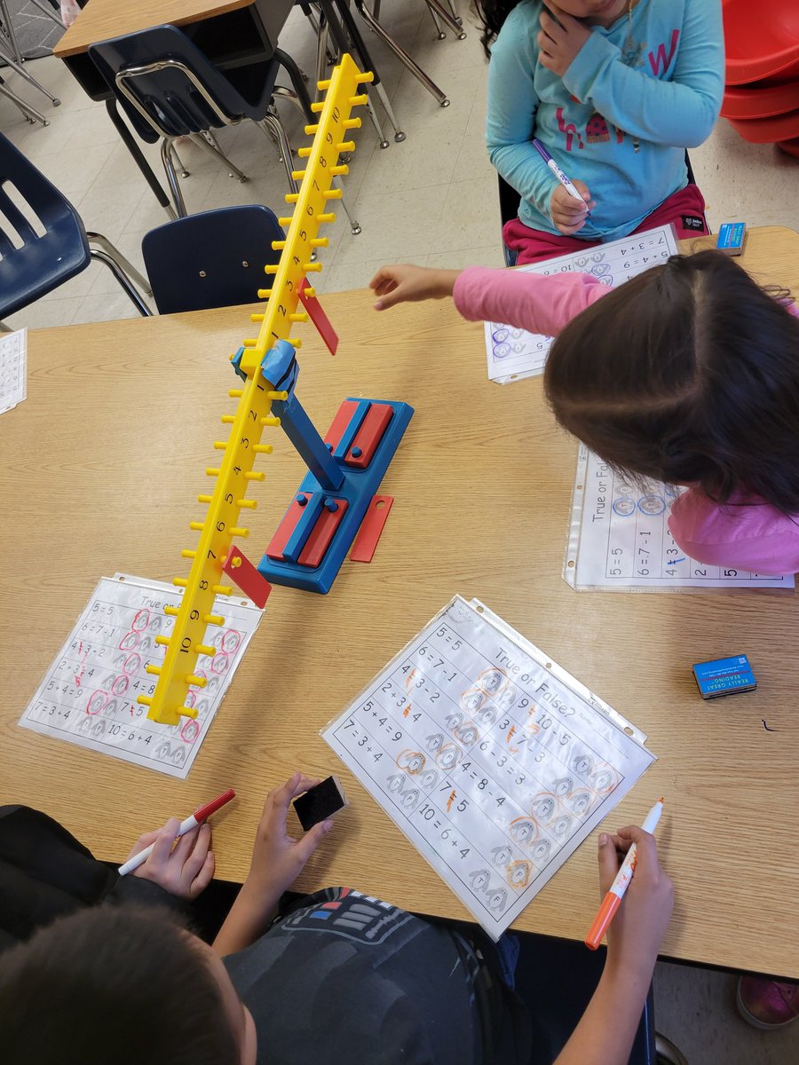 HMES 1st grade EIP students represent the expression on each side of an equation using a number balance. @HeardMixon #ncssbethebest #mathisfun #equalsigntruth