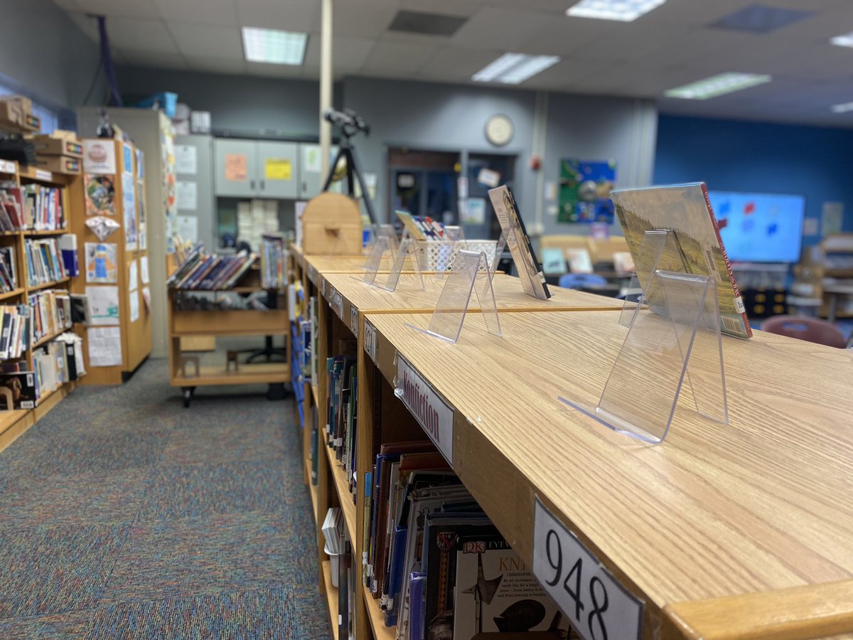 One of the perks of Reading Week is getting to check out five books! Love those empty shelves and displays. #BentonBold