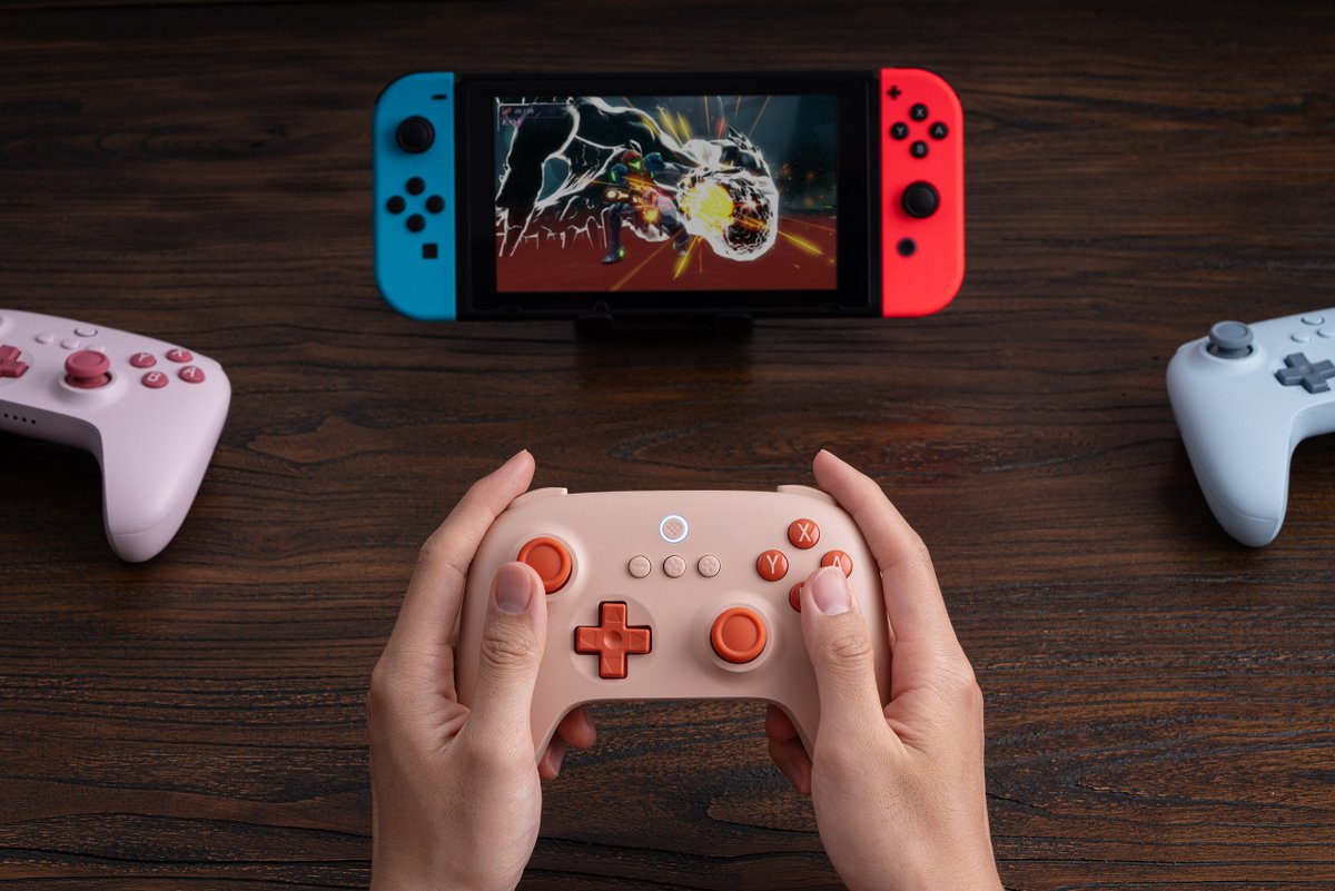The 8BitDo Ultimate C Bluetooth Controller. Simplified, with the same ultimate quality. Compatible with Switch. Available in Blue, Pink, and Orange.
