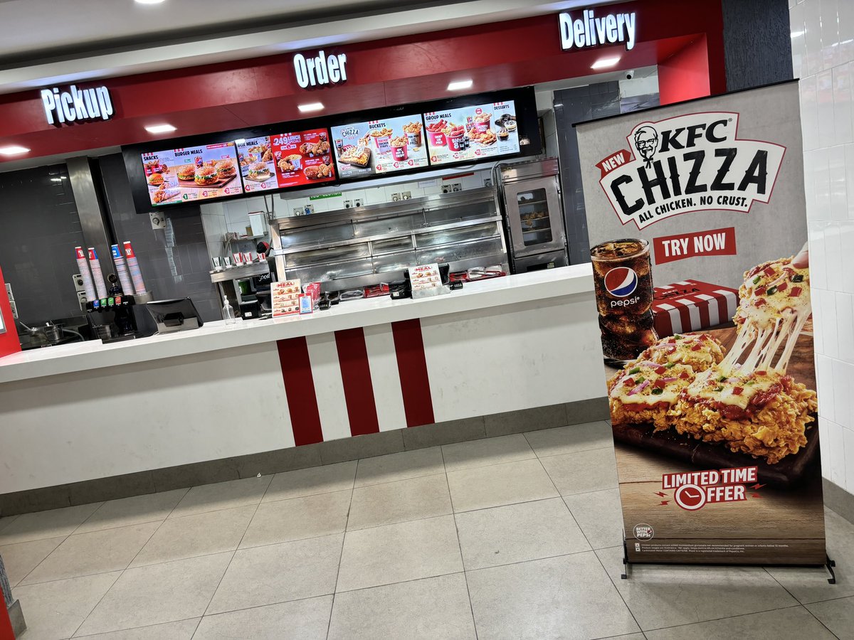 iPradeepthinks's tweet photo. @KFC_India @KFC_ES @kfc can anyone answer here why chizza is available only on these boards not in vijayawada Andhra Pradesh stores..? It’s been a couple of months..!! https://t.co/0LKY0Xbu9U