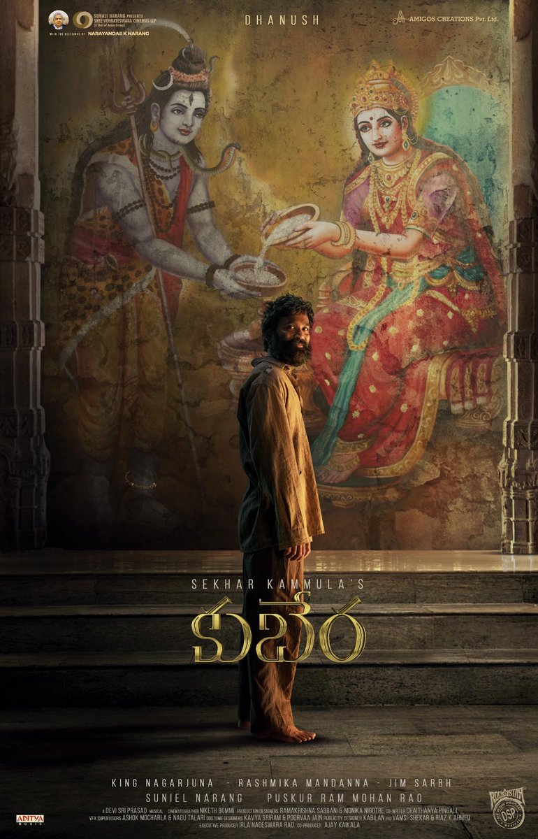 KuberaaTheMovie's tweet photo. On this auspicious Maha Shivratri,
we unveil the First Look and Title Motion Poster of #Kubera ❤️‍🔥❤️‍🔥

Witness this man stirring up the proceedings in theaters soon! 💥💥

▶️ https://t.co/p21yJ0tKL9
#KuberaFirstLook

@dhanushkraja King @iamnagarjuna @iamRashmika @sekharkammula @jimSarbh @ThisIsDSP @AsianSuniel @puskurrammohan @SVCLLP @amigoscreation @UrsVamsiShekar @RIAZtheboss @V4umedia_ @AdityaMusic @KuberaMovie