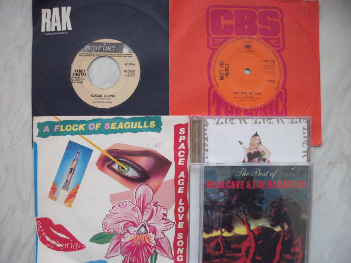 My latest charity shop finds (all 50p each). Really pleased to pick up Sugar Town, & Roll Away the Stone on 45rpm.