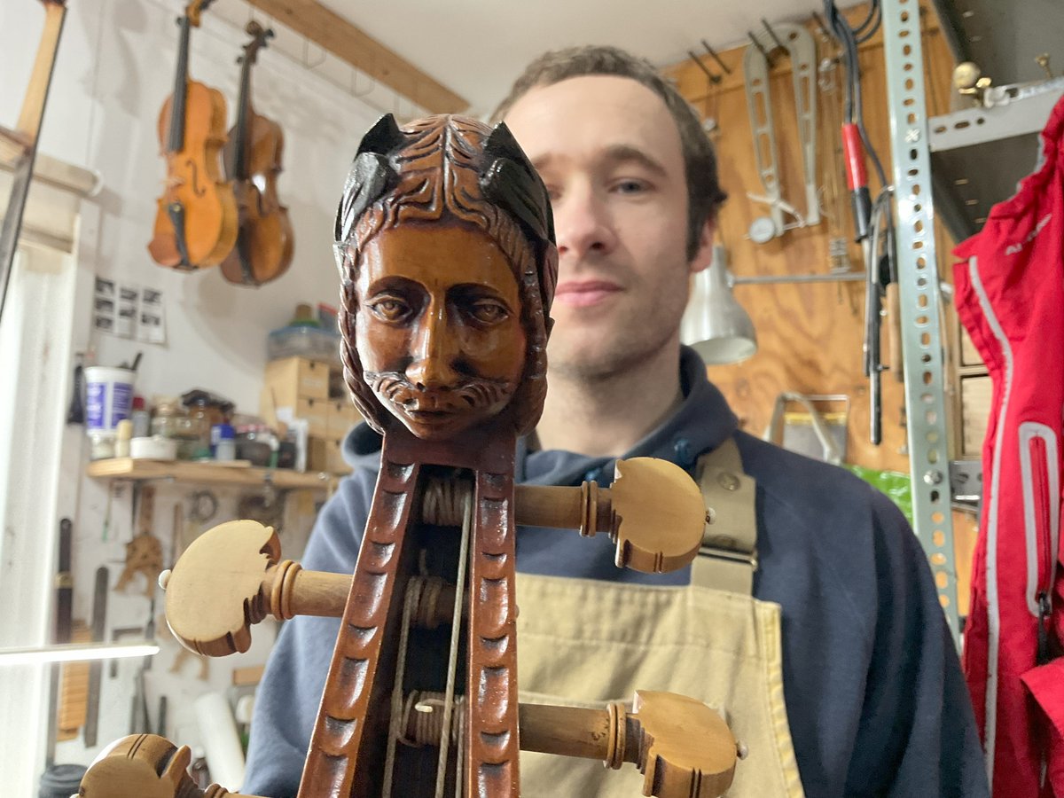 Here’s Ed holding a copy of a Barak Norman viol that he made whilst at West Dean College which he’s readying for sale #viol #luthier #woodcarving