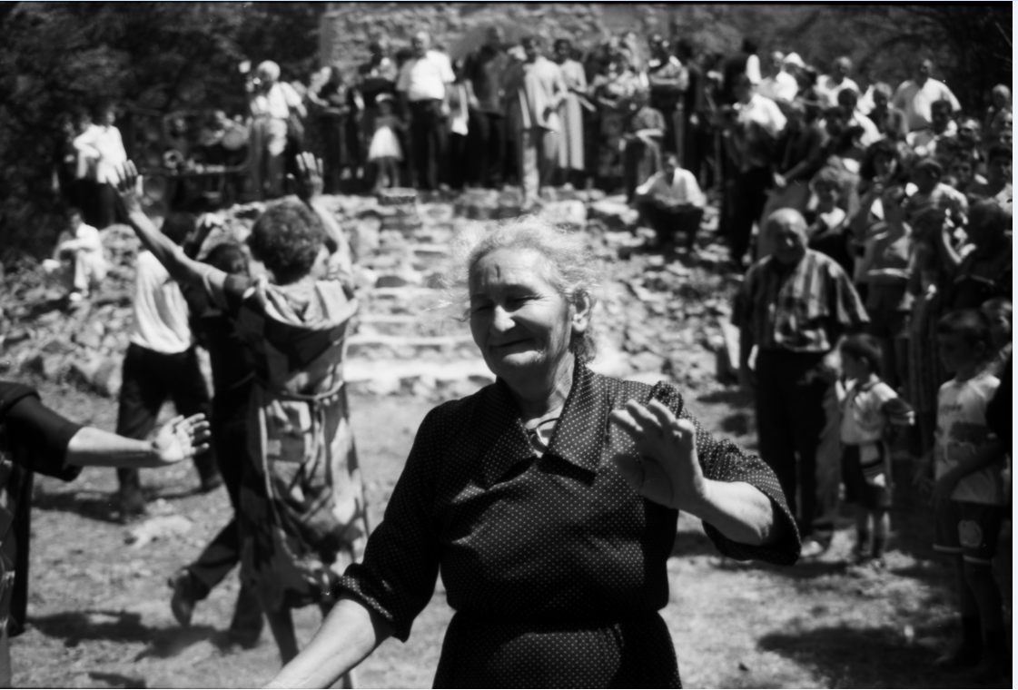 Happy #InternationalWomensDay #IWD2024 to all women worldwide. Image is from Photojournalist Ann Doherty's stunning collection donated to #Donegal #Archives & subject of an exhibition in @Donegalcomuseum in 2022. A woman celebrates in Armenia, c. 1990s