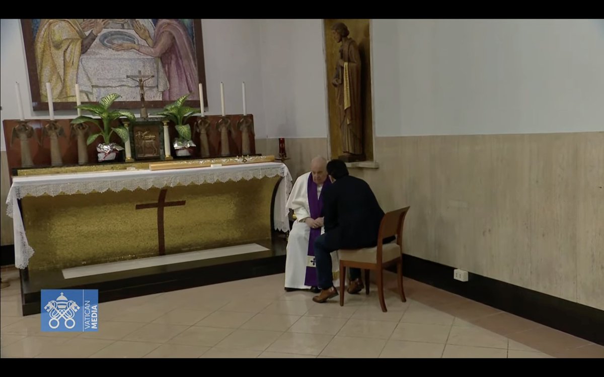 #PopeFrancis hears a man's confession during a Lenten penance service at a Rome parish.