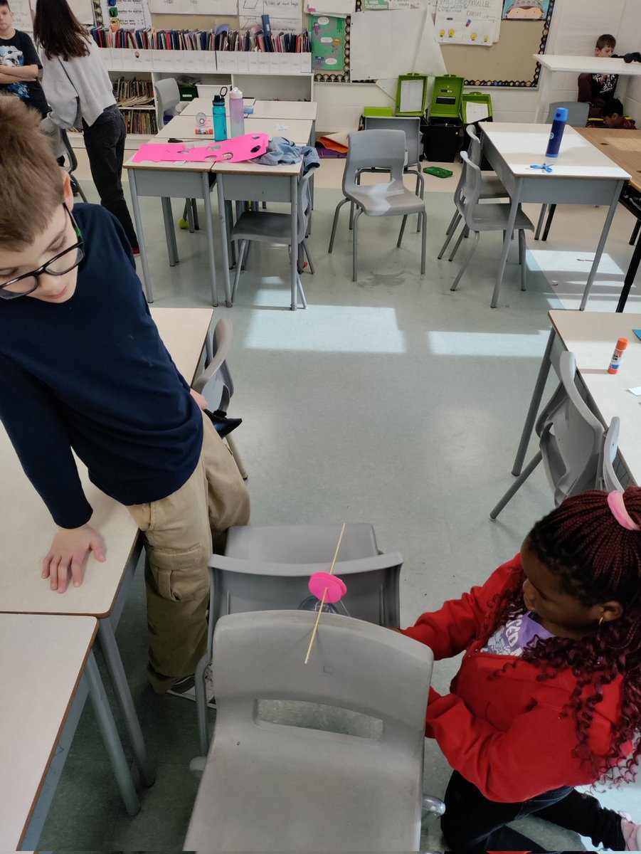 mralexng's tweet photo. Using our collaboration skills to build a pulley for our simple machines unit! #scienceisfun @AssisiOCSB https://t.co/o2SAHPk0GG