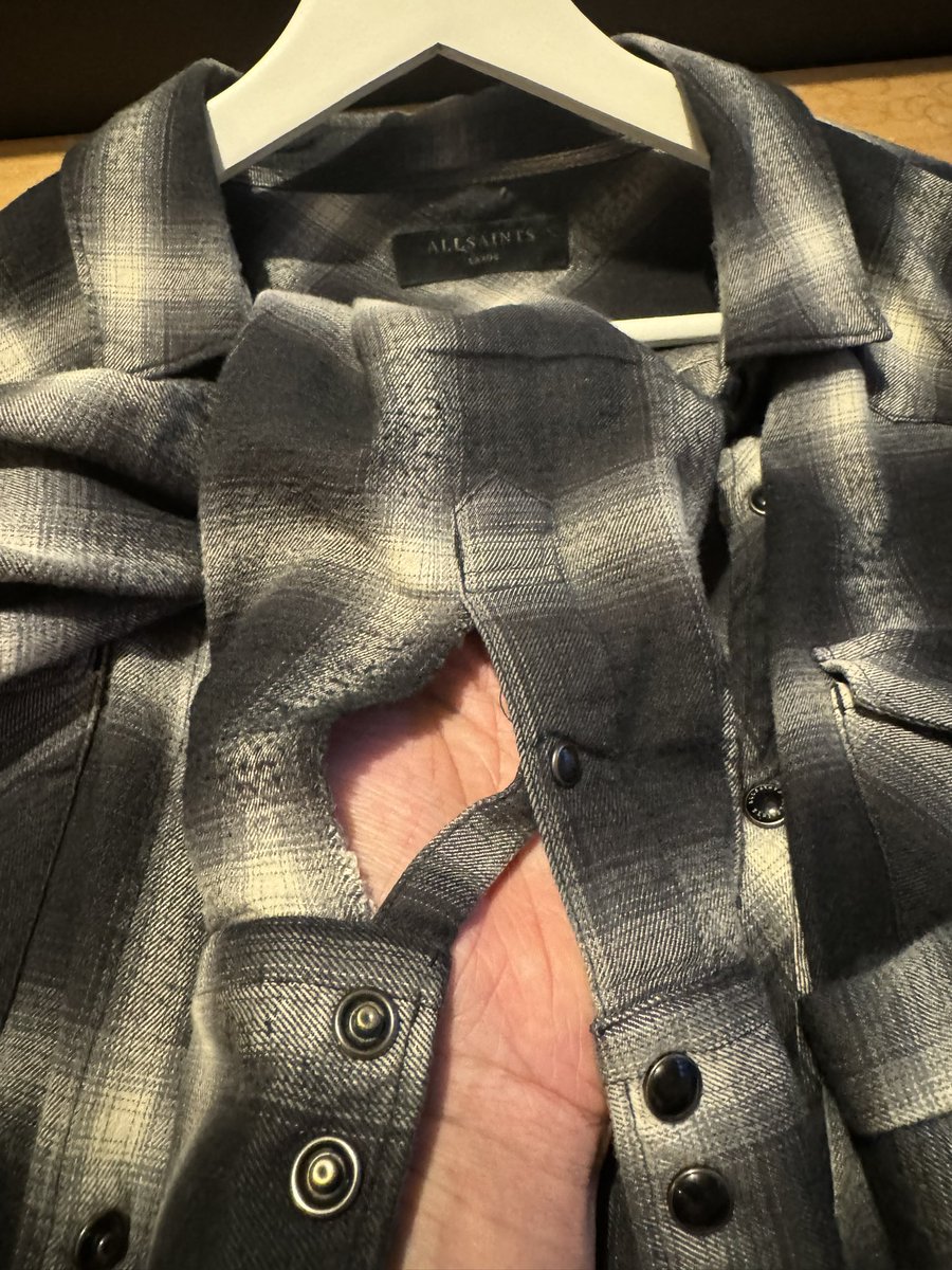 skifflad's tweet photo. I have multiple shirts. But only two are like these. Thanks @AllSaintsLive @AskAllSaints - problem? https://t.co/BgBjCmVjGl