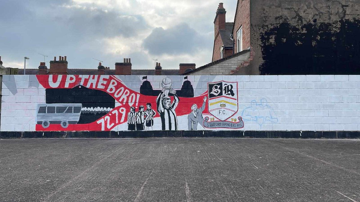 SRFCofficial's tweet photo. π¨ Day Three Progress Update! ποΈ The Stafford Rangers mural is coming to life, capturing the essence of our football journey! Exciting times ahead as our visual story unfolds! β«οΈβͺοΈβ½ #StaffordRangers #MuralInProgress #ArtisticJourney https://t.co/i3nnCdlG7A
