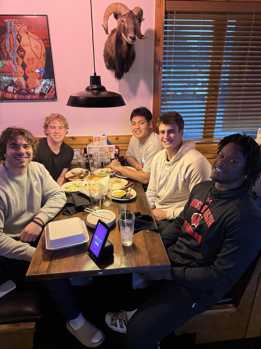 Dinner with the OLB’s and some tag-alongs. Fueling these guys up for another week of workouts. #OnWisconsin