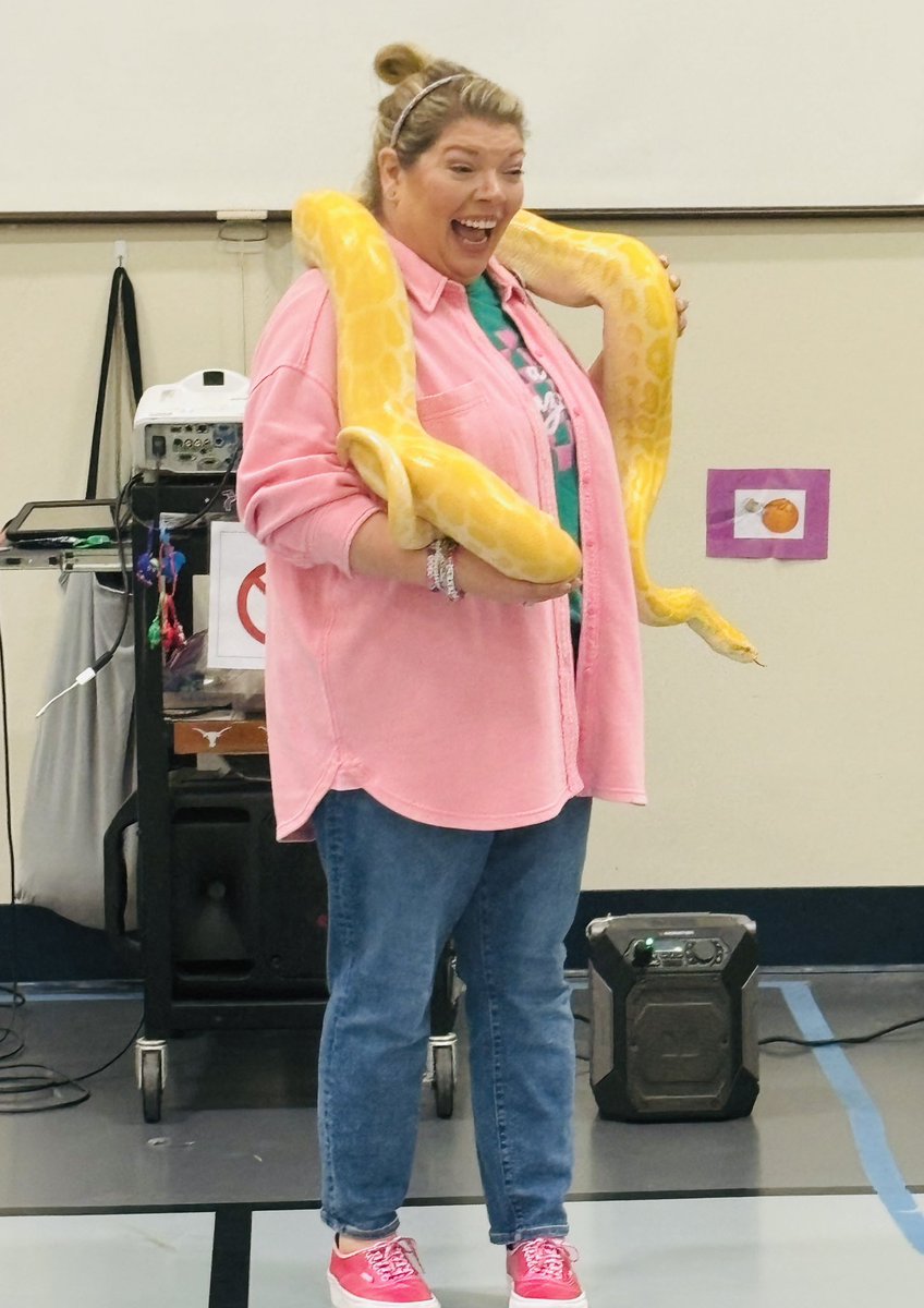 Keri_A_McCarty's tweet photo. ✨ Had my “Britney Spears circa 2001 VMAs” moment today!! What a fun experience to share with our students.  Both Bernice the Burmese python &amp; Kenzie the kangaroo were adorable.  Baxter loved seeing all the new friends!  
@BMEBaxter @hebisd #BeABobcat https://t.co/E11TptP0x7