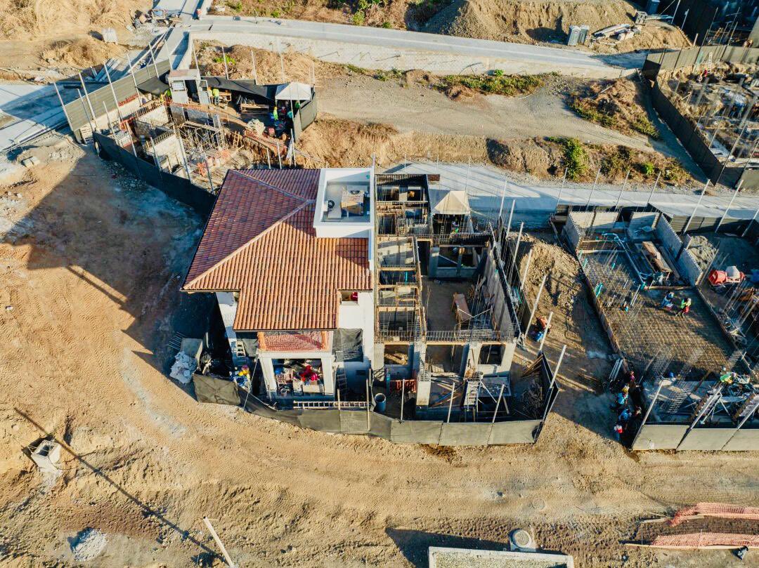 CastilloArqUrb's tweet photo. A walkable neighborhood grows in Costa Rica. Aerial view of the progress on the new neighborhood of El Prado in Las Catalinas, where some of the houses we designed occupy center stage around a new park. https://t.co/Y2DVWt6xMJ