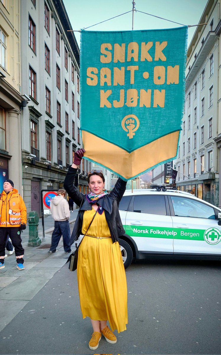 I was turned away from the women’s rights march today in Bergen. My banner says: “Snakk sant om kjønn”, i.e. “Speak truthfully about sex/gender”. A second banner was also turned away: “we support JK Rowling”. We were made to walk behind the police car that followed the march.