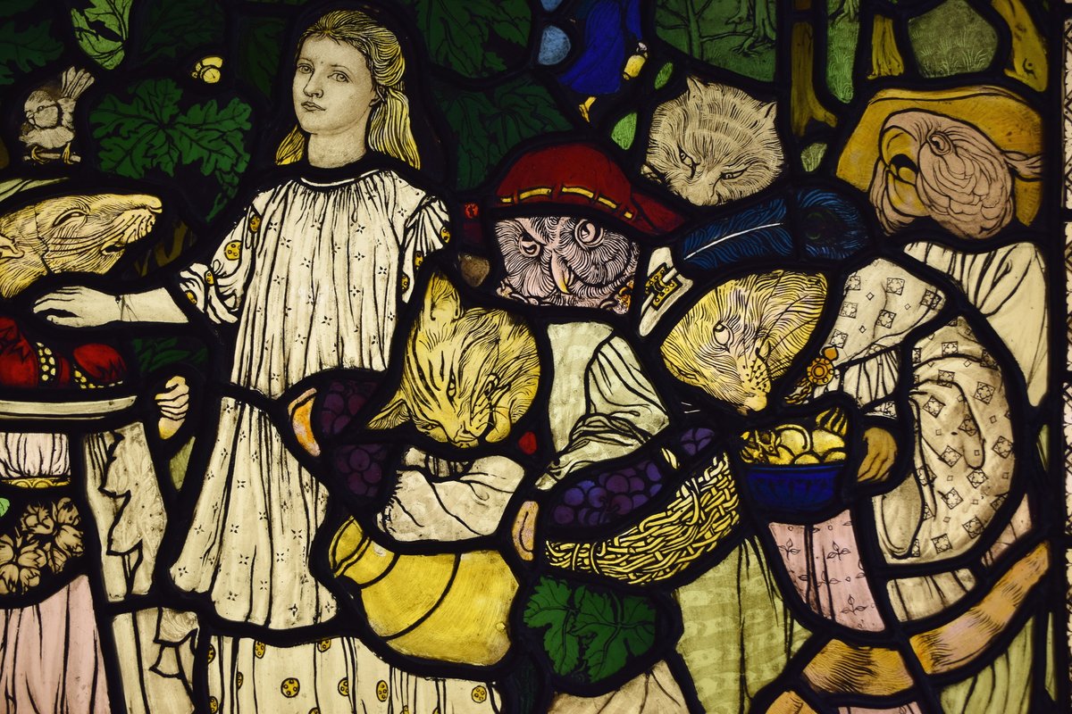 Margaret Agnes Rope was one of the principal figures of early 20th Century glass art. Her c1908 studio piece 'Goblin Market' is now displayed in the conference room of Lucy House, Kesgrave, Ipswich. It depicts Laura meeting the Goblins in this except from Christina Rossetti's