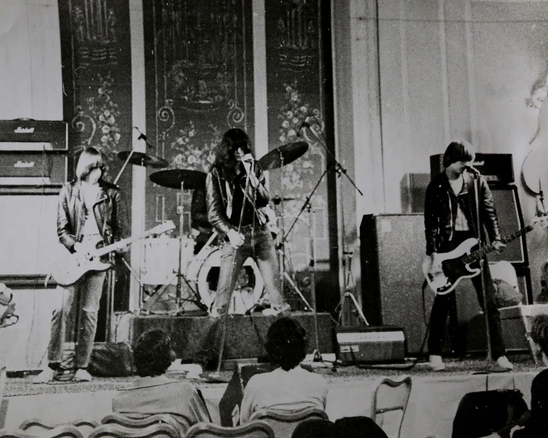 This week in March 1977, Ramones hit Seattle, WA, with over 400 fans packing the Olympic Hotel’s 150 person-capacity Georgian room. The show was organized by recent high school graduates, Neil Hubbard and Robert Bennett. Photos by Neil Hubbard